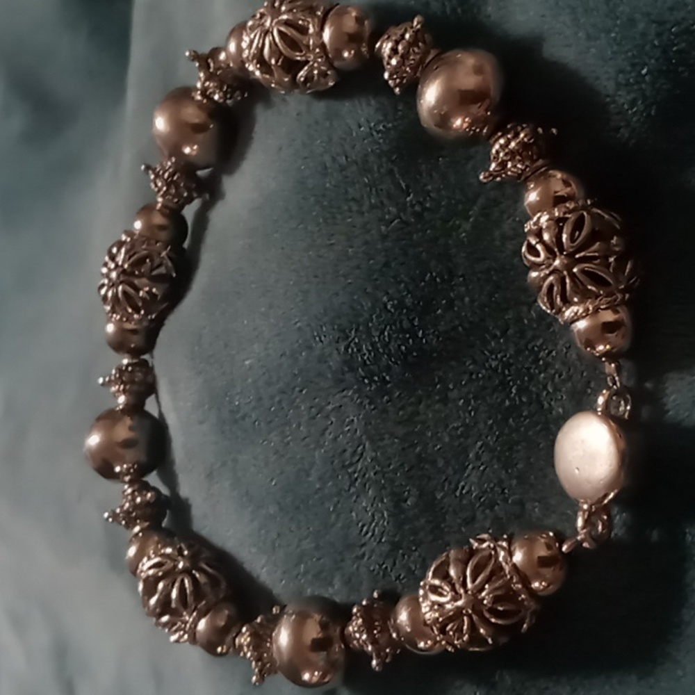 Metal beaded bracelet with a magnetic clasp.size 8